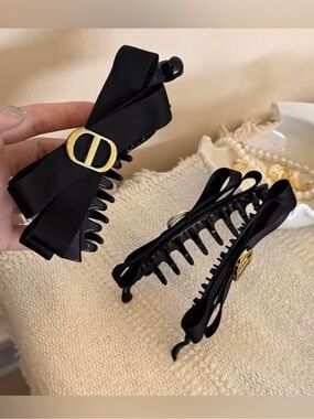Macy's Black Bow Hair Claw Clip with Gold logo